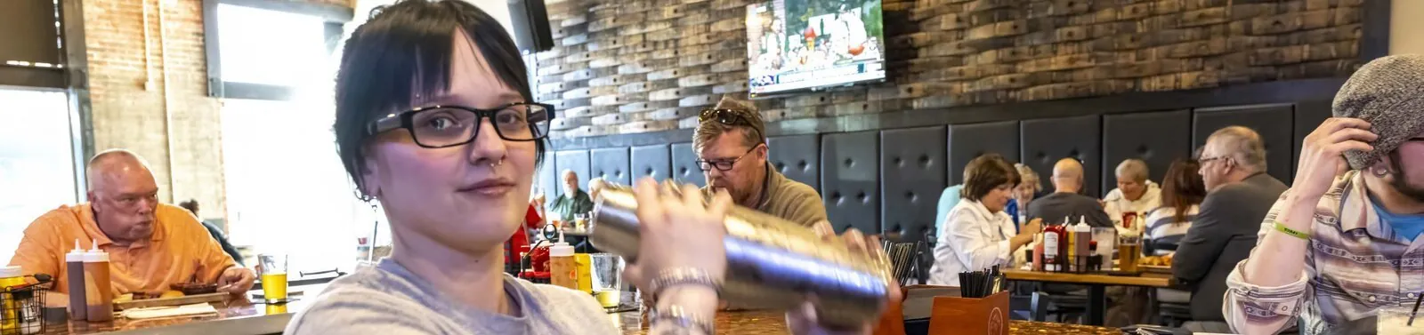 Ole Crow Tavern dining area with bar shaker