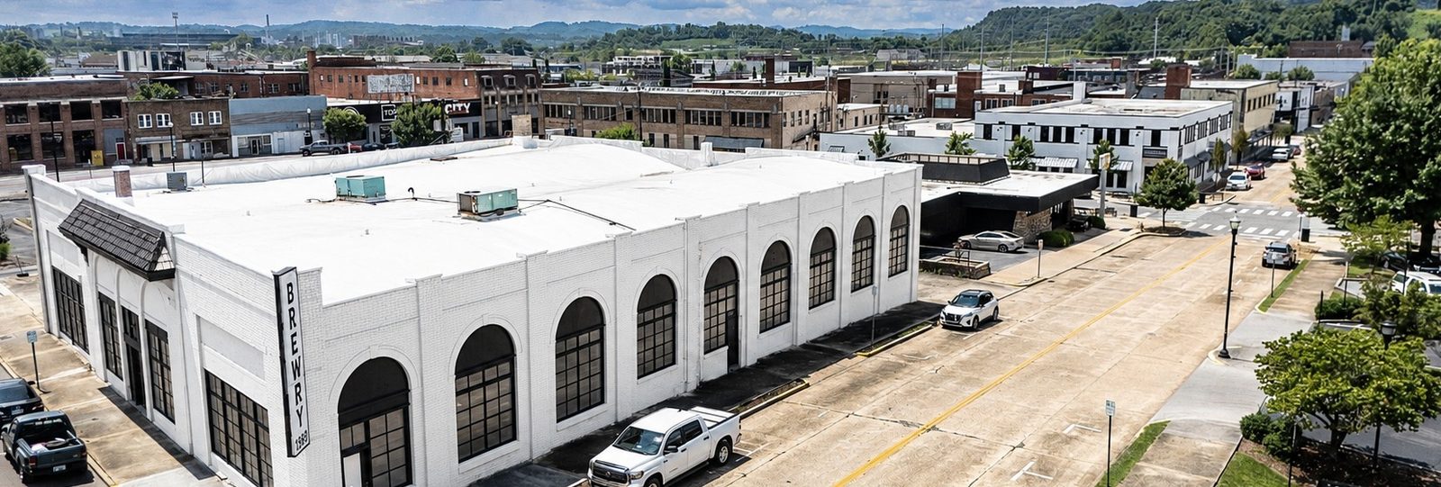 Historic Ford Dealership. Semi-Truck Access. Downtown Opportunity Zone | For Sale or Lease $680,000
