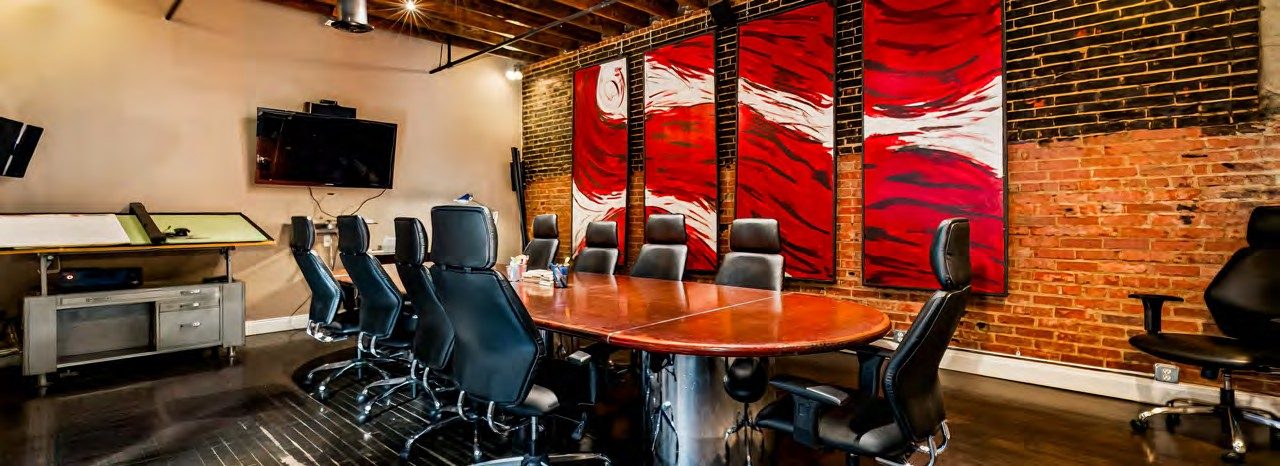 Conference room with exposed brick, Progress Building Kingsport